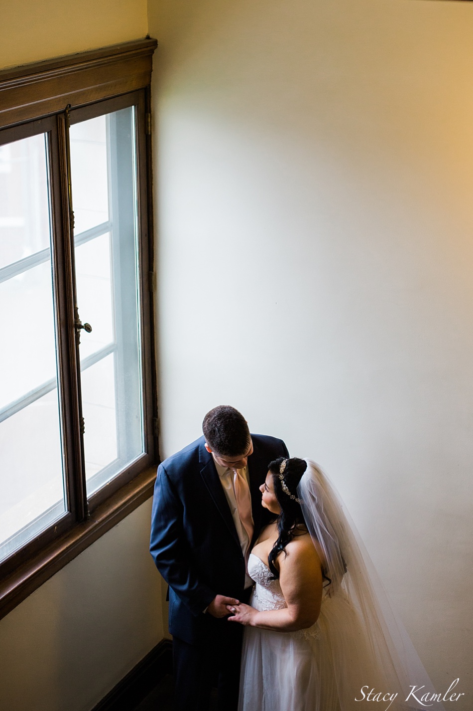 Bride and Groom on stairwell in Grand Island Courthouse