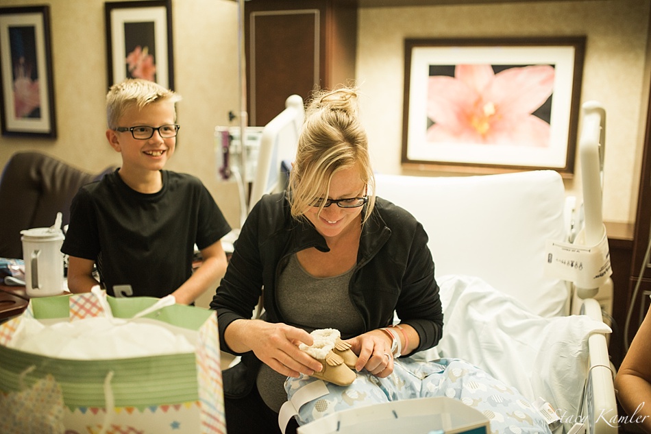 Opening up gifts for Newborn