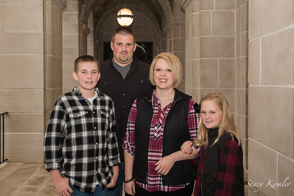 Red and Black plaid shirts and black vests for family portraits