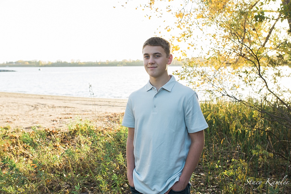 High School Boy Portraits at golden hour by wagon train lake