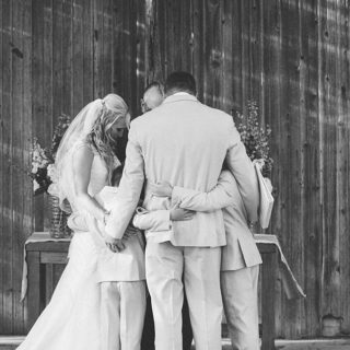 Family prayer during ceremony