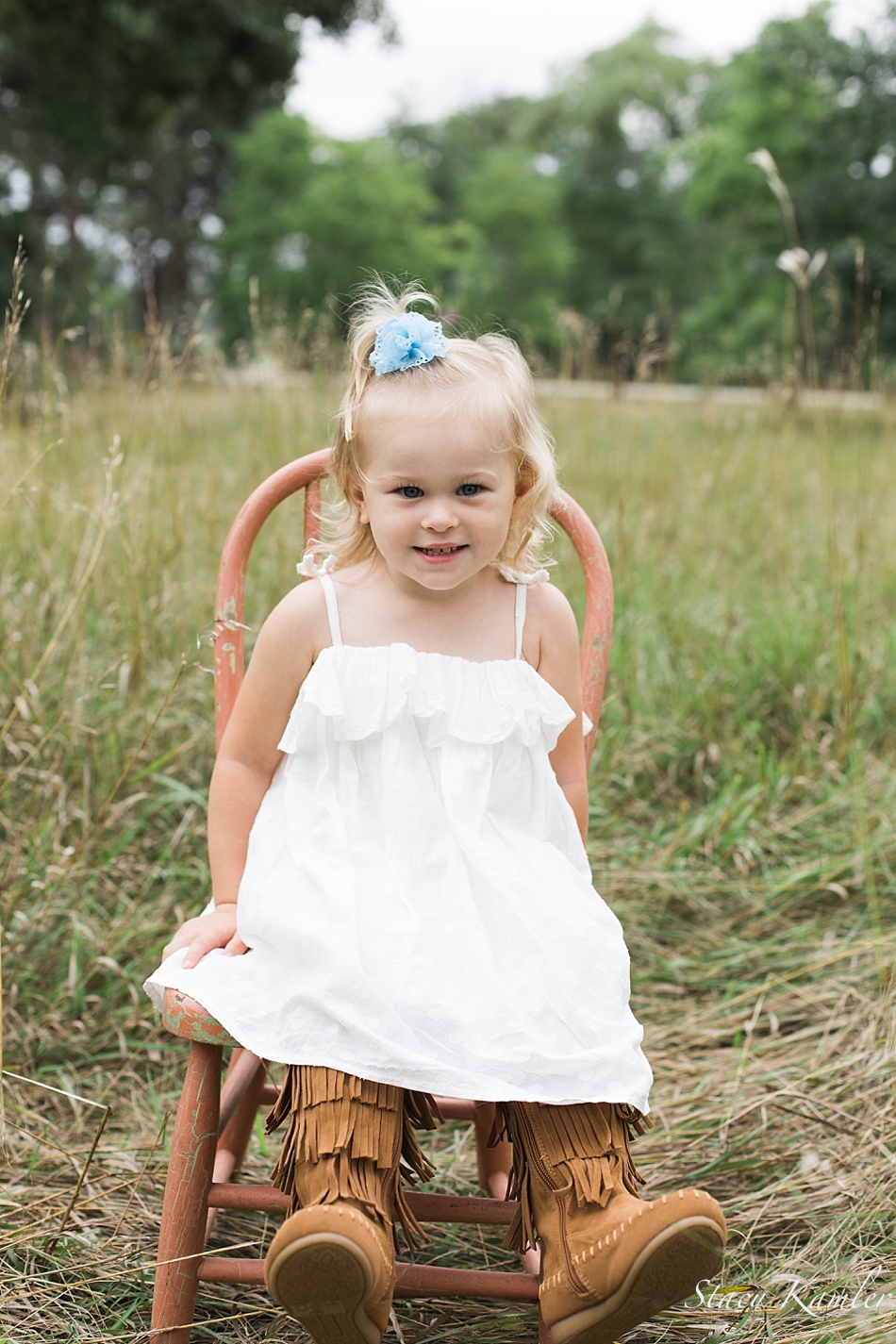Turning Two portrait session in white dress and brown fringe boots