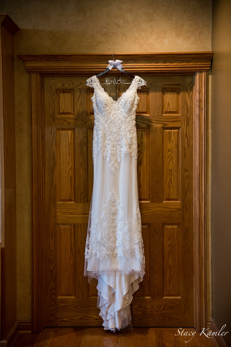 Dress hanging by door