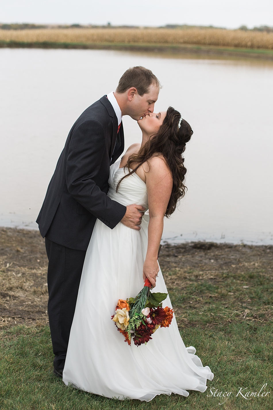 Bride and Groom Portraits by Lake in October