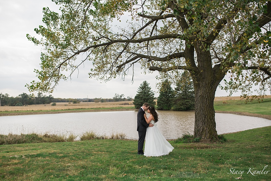 Bride and Groom Portraits by Lake and big tree