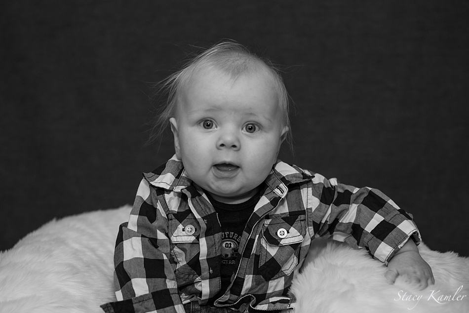 5 month old in plaid shirt