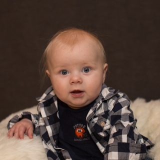 Nebraska Portrait Photographer - 5 months old in plaid shirt