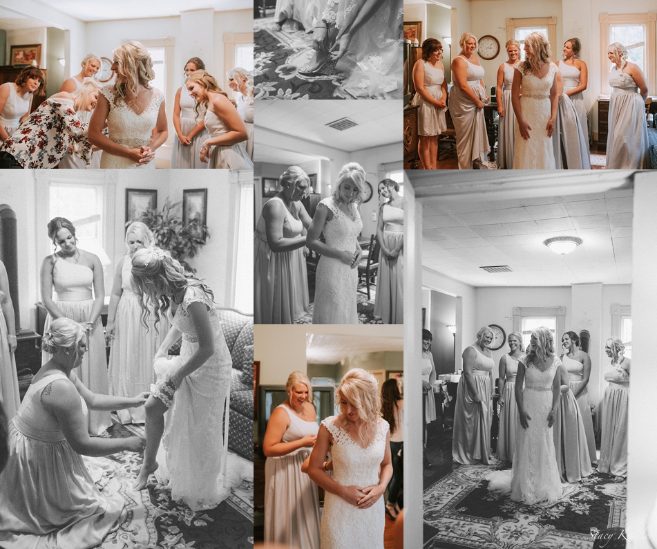 Bridesmaids helping bride get dressed at Praire Creek Inn, Lincoln, NE