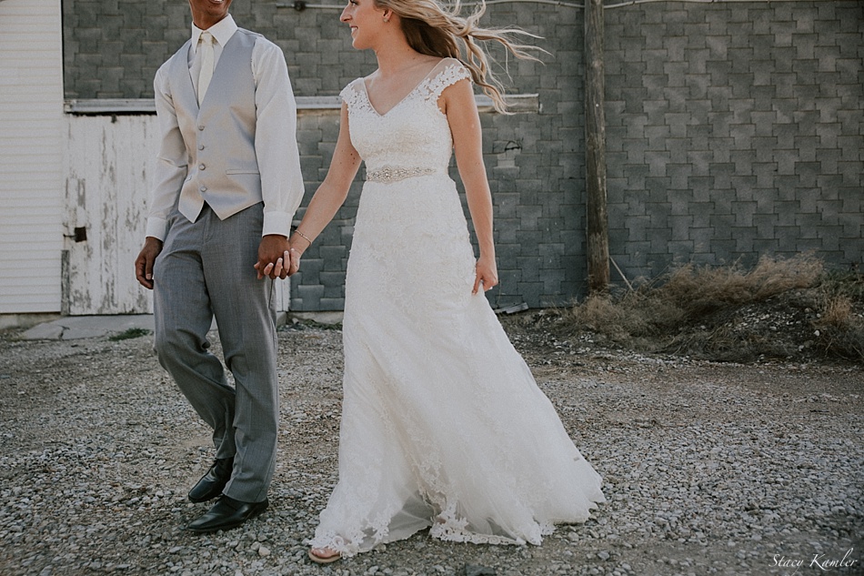 Antique lace wedding dress and grey tux