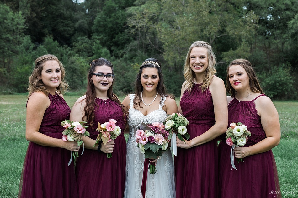 Bride and Bridesmaids in burgundy dresses