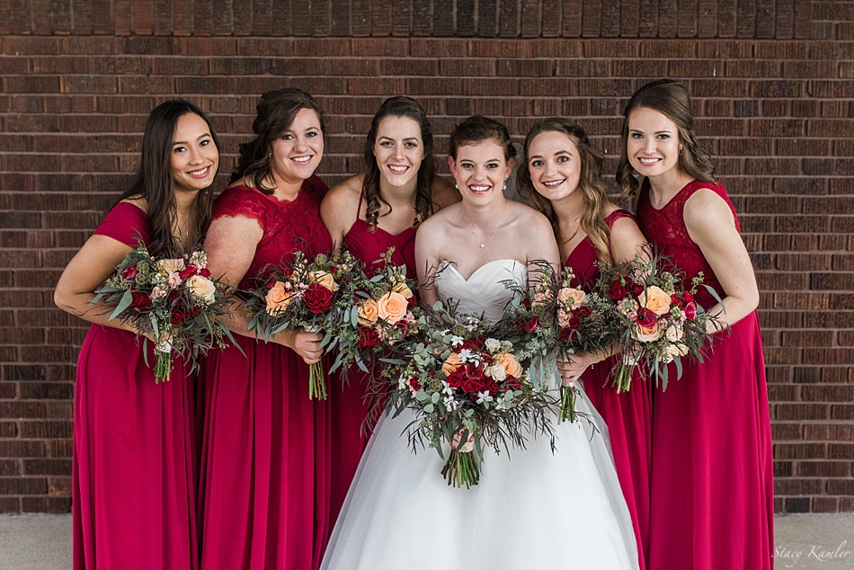 Bridesmaids with red dresses