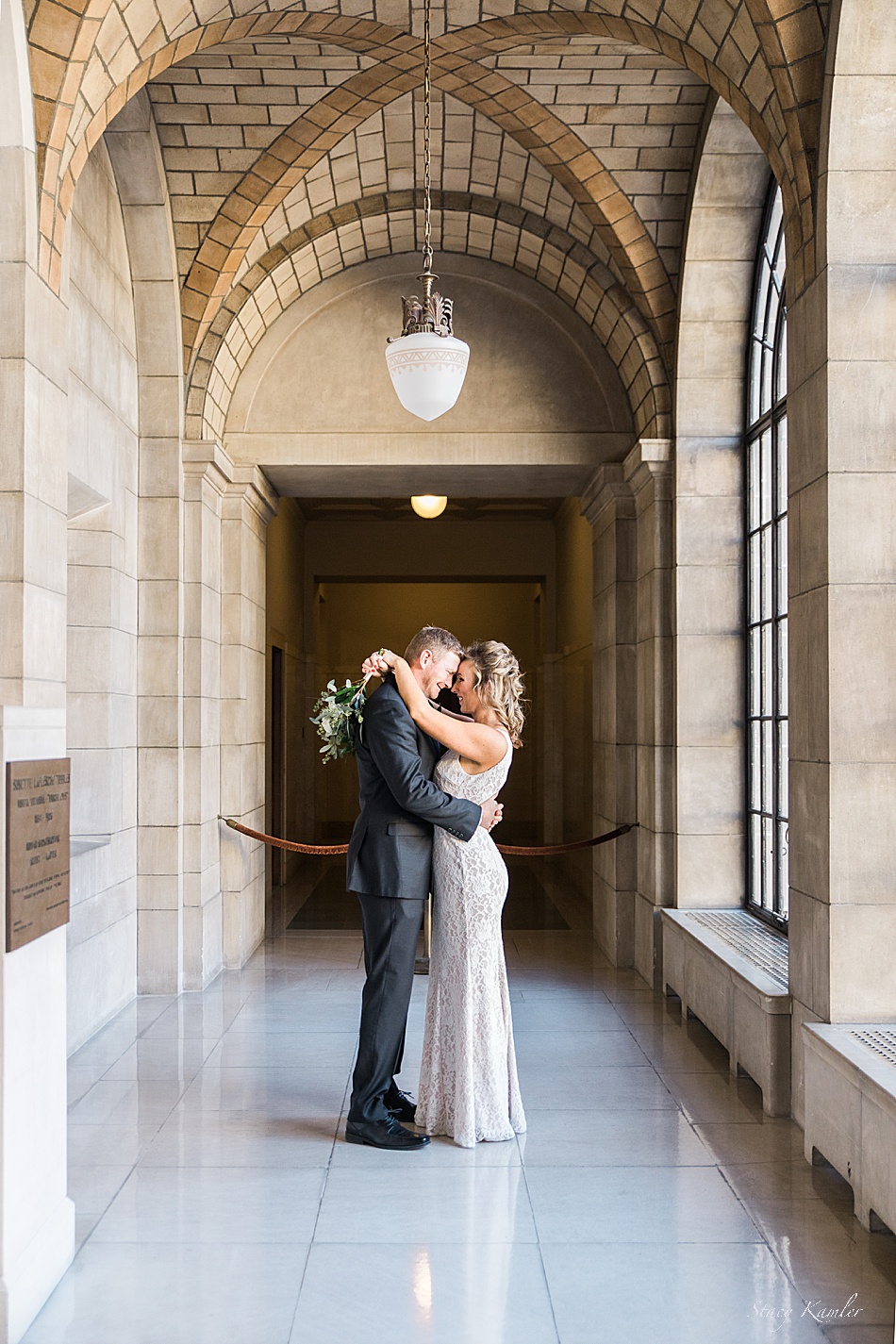 Bride and Groom photos after an intimate winter wedding at the state capitol