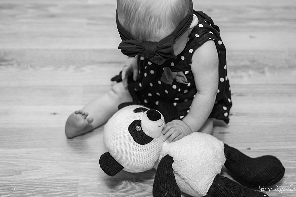 Happy girl with her stuffed animal during photos