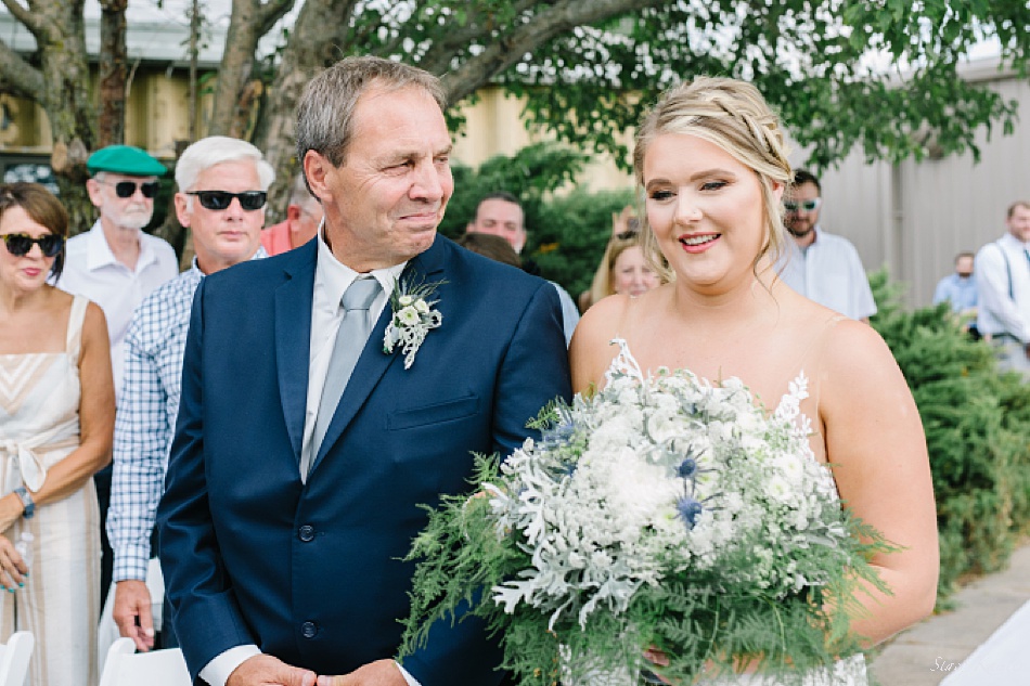 Bride walking down the isle with her dad