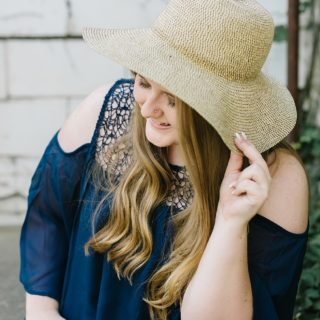 Senior girl in straw hat, downtown