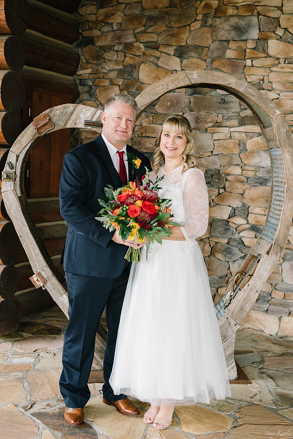 Portraits of bride and groom in front of Wilderness Ridge