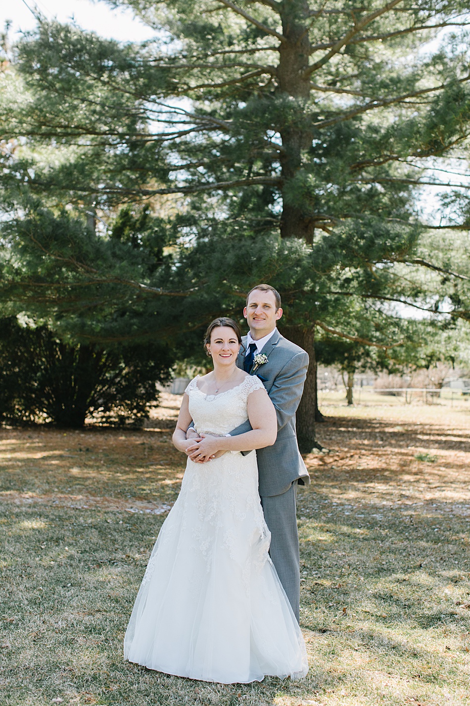 Bride and Groom in front of Pine Tree